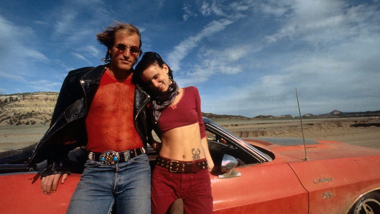 woody harrelson and juliette lewis in front of a car in a scene from the film 'natural born killers', 1994 photo by warner brothersgetty images