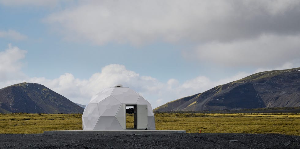 the new plant of swiss start up climeworks is pictured in hellisheidi, iceland on may 8, 2024 a swiss start up unveiled on may 8, 2024 its second plant in iceland sucking carbon dioxide from the air and stocking it underground, scaling up its capacity tenfold with the aim of eliminating millions of tonnes of co2 by 2030dubbed mammoth, the plant lies just a few hundred metres yards from its little sister orca, a pioneering facility opened by swiss start up climeworks in september 2021 in the middle of a moss covered lava field about a half hour drive from the capital reykjavik photo by halldor kolbeins afp to go with afp story by mathilde dumazet photo by halldor kolbeinsafp via getty images