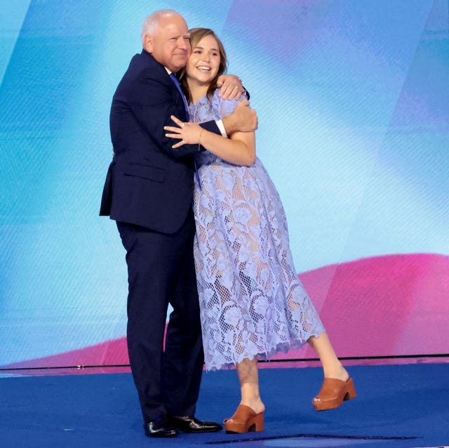 dnc chicago, il august 21, 2024 democratic vice presidential nominee minnesota gov tim walz gives his daughter hope a hug during the democratic national convention wednesday, aug 21, 2024, in chicago, il myung j chunlos angeles times via getty images