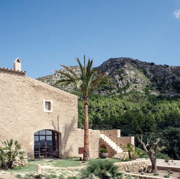 es racó d'artà, mallorca,  main building “ possessió”  and in background,  natural park of llevant