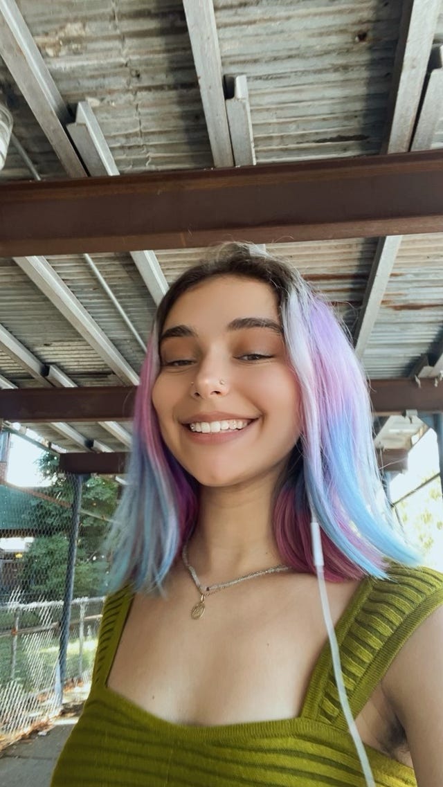 a woman with purple hair