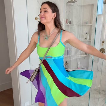 two images of jennifer garner wearing the colorful versace dress from 13 going on 30