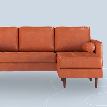 a brown couch with a cord