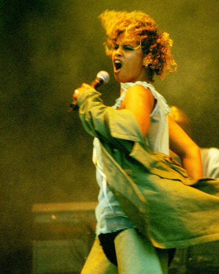 Neneh Cherry singing furiously at Glastonbury  in 1997.