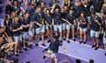 British athletes react during the Olympic closing ceremony at the Stade de France.