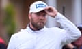 Daniel Brown adjusting his hat on the 18th hole during day one of the Open Championship