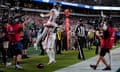 Atlanta Falcons wide receiver Drake London celebrates his touchdown with Atlanta Falcons guard Chris Lindstrom