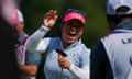 Megan Khang of Team USA celebrates making a putt on the 11th.