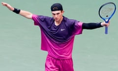 Jack Draper raises his arms in celebration after defeating Alex de Minaur in their US Open quarter-final