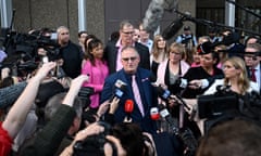 Journalist Hedley Thomas (C) along with Greg Simms (C, rear) the brother of Lynette Dawson, and his wife Merilyn (C-R), address the media outside the Supreme Court of New South Wales