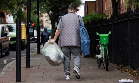 A prisoner walks away with his belongings outside HMP Pentonville in London, last week.