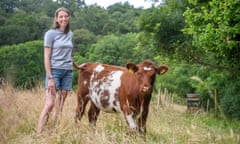 Holly Purdey with a beef shorthorn calf at Horner farm