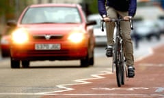 A person cycling on a bike lane