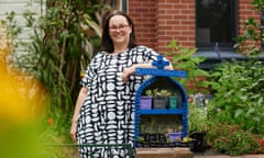 Sarah Davidson with the plant library she runs