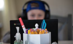 Child studying in front of computer screen