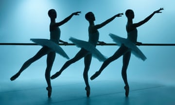 Ballet dancers Katherine Sonnekus, Belle Urwin, and Sharni Spencer hold a barre and dance in The Australian Ballet's performance of Études