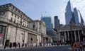 The Bank of England building pictured from Bank junction with the Royal Exchange to the right