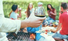 Young friends having barbecue picnic