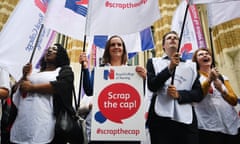 Nurses protest against the pay cap outside the Ministry of Helath in London<br>epa06052581 Nurses begin a summer of protest against the British Government's pay cap outside the Ministry of Health in central London, Britain, 27 June 2017. Media reports state that nurses and health care assistants will join protests in 30 locations across Britain, timed for the June pay day in the National Health Service (NHS), to mark the start of the Royal Colleage of Nursing's (RCN) ‘summer of protest’. The RCN are calling for the British Prime Minister Theresa May to remove the one per cent pay cap the current restriction on pay increaeses that has been in place for the past seven years.  EPA/ANDY RAIN