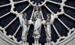 A view shows statues of the western rose window of Notre-Dame Cathedral after a massive fire devastated large parts of the gothic structure in Paris, France, April 16, 2019. REUTERS/Benoit Tessier