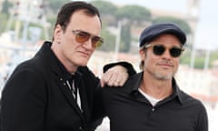 Quentin Tarantino and Brad Pitt with arms around each other