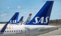 Scandinavian Airlines planes lined up at Stockholm Arlanda airport