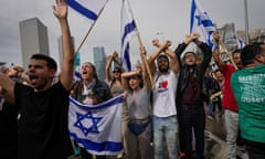 Demonstrators protest in Tel Aviv against the plans of Benjamin Netanyahu's government to overhaul the judicial system.