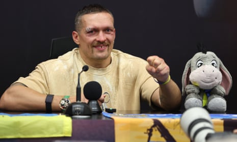 Oleksandr Usyk of Ukraine reacts during a press conference after defeating Tyson Fury to win the undisputed world heavyweight championship in May.