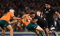 Australia’s Reece Hodge is tackled by New Zealand’s Sevu Reece during the Rugby Championship Test in Auckland.