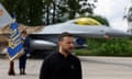 Ukraine's President Zelenskiy speaks to the media in front of an F-16 fighter jet. Donald Trump has said he will ‘probably’ meet with the Ukrainian leader.