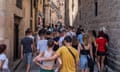 A large group of tourists in Barcelona.