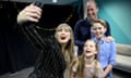 Prince William and his children pose with Taylor Swift.