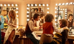 Writers, actors, and comedians gather in the dressing room of a television set in the 70s