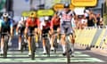 Alpecin - Deceuninck's Jasper Philipsen (right) celebrates after the finish in Nîmes. 