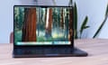 Apple MacBook Pro M4 review showing the macOS Sequoia 15.1 desktop on a table.