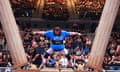 Rebecca Roberts straddles between two pillars at the 2022 World's Strongest Nation competition.