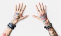 Hands with tattoo on white background