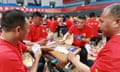 Guandan Competition In Huaian City<br>Players compete in the final of the Guandan (chess and card game) competition at the Xuyi County Stadium in Huaian City, East China's Jiangsu Province, June 18, 2023. Guandan is a poker game originated in Huai 'an, where the game is played by four people in pairs. (Photo by Costfoto/NurPhoto via Getty Images)