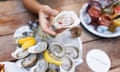 A dish of shucked oysters on ice