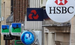 bank branch signs on a UK high street including barclays, lloyds, hsbc and natwest