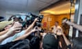 The crowd of journalists are hearing from Gold Apollo founder and chief executive Hsu Ching-kuan at the door of the company's office in New Taipei City.