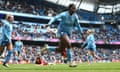 Khadija Shaw celebrates after scoring for Manchester City against Manchester United in March.