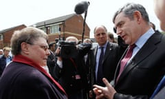 Britain's Prime Minister Gordon Brown speaks with resident Gillian Duffy 