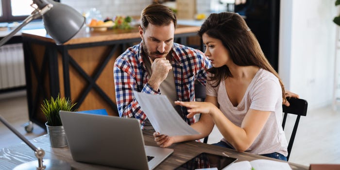 couple is going through their home finances