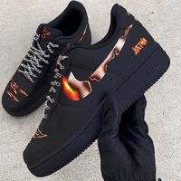 Elevate your style with these Black Orange Fired Swoosh Custom Air Force 1 sneakers. The bold black and orange colorway will make you stand out while the iconic swoosh adds a touch of familiarity. Experience the perfect blend of comfort and statement-making fashion with these custom kicks. Exactly as shown in the pictures. 📷 Brand New & Authentic. 💯 Hand Painted with attention to detail. 👨‍🎨 Waterproof and Flexible. ❤️ Unisex model. Please refer to the Size Chart. 👟👫 Free Worldwide Shippin