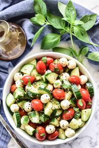 Switch up your caprese salad with the addition of cucumbers! This Cucumber Caprese Salad is light, flavorful, and perfect for summer. One of our favorite ways to use all those fresh garden veggies!