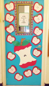 Fall Apple Door.  Children made apples using construction paper and black beans for seeds then, I added a large "eaten" apple.  Title is, "God loves us to our core!"