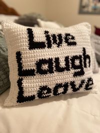 Live Laugh Leave. Who wouldn't love to come home to this funny pillow!  I also sell the pattern for this pillow. It is advanced beginner and fun to make with only three types of stitches used! Fair isle is used for lettering. Makes a great unique gift for Christmas or housewarming party for that someone who has everything and a sense of humor! Finished product measures 14x14   Please check back to my shop often as I love to create and will be adding more listings  I also welcome any ideas for a