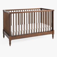 Set the foundation for a charming and sophisticated sleep space for baby with this convertible crib. Featuring whimsical wood turnings and an airy, open slat construction, this versatile piece adjusts to their growth and can transition to a toddler bed when used with the guardrail conversion kit (sold separately). Its warm dark walnut finish highlights the wood's grain and complements the rest of the collection seamlessly. Designed in collaboration with celebrated home designers and renovators,