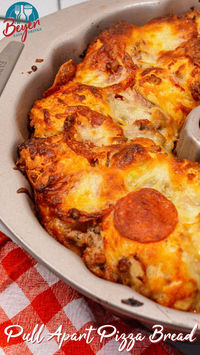 Make pizza a finger food appetizer with this sausage and pepperoni pull apart pizza bread. With Grands biscuits or another large refrigerator biscuits, pepperoni, sausage, garlic, shredded mozzarella cheese, and pizza sauce you are on your way to the best finger food pizza recipe with every single bite.